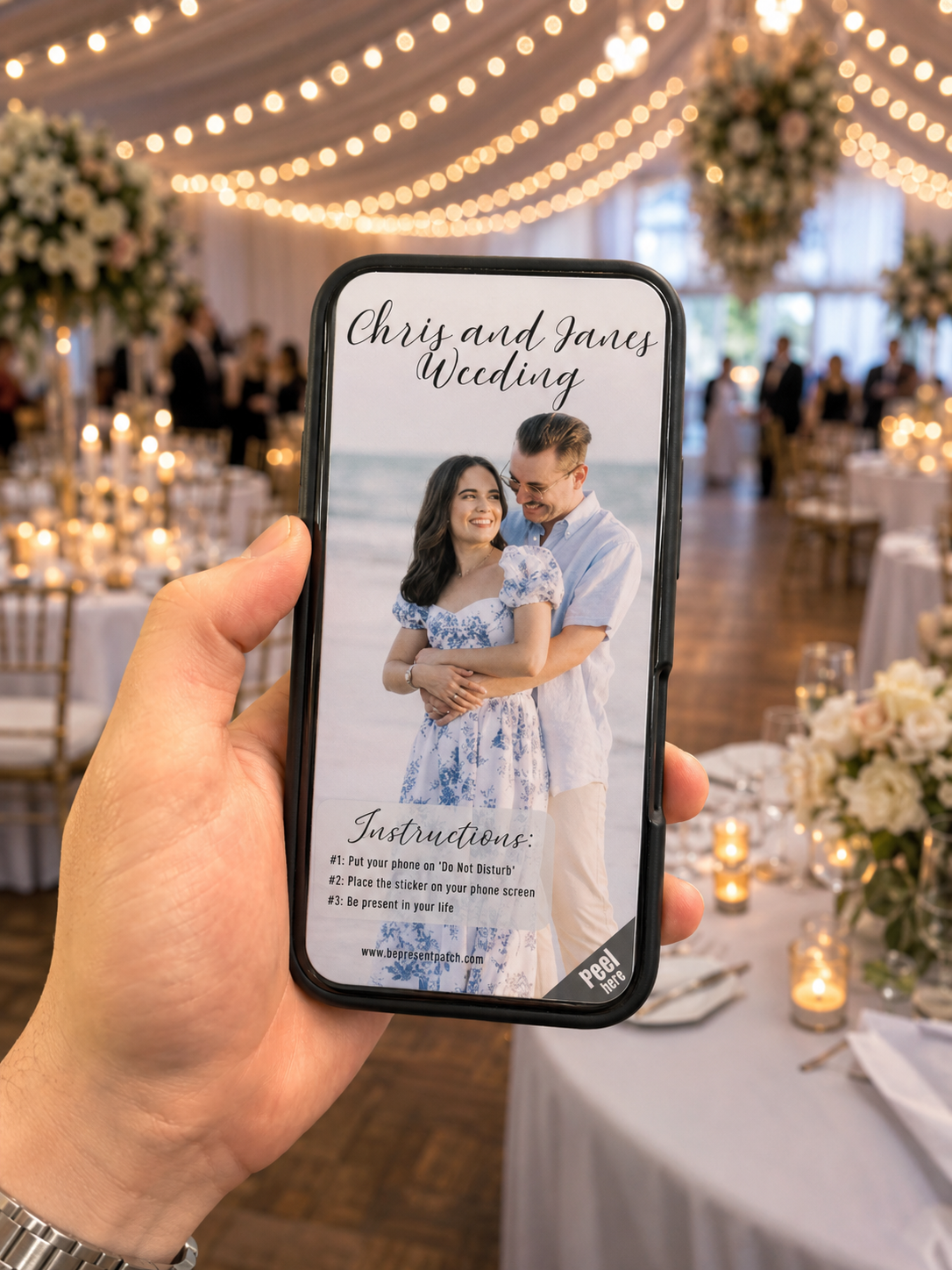 Custom wedding Be Present Patch on a phone at a wedding reception